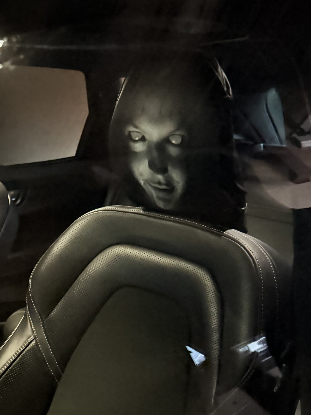 Close-up of the PhantomSeat ghost face print and plush fabric