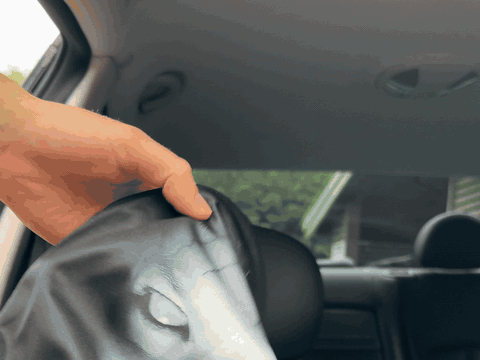 Stretch fabric of the PhantomSeat cover held in hand